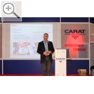 CARAT Leistungsmesse 2013 Thomas Vollmar präsentiert ELEKAT 2.0 und das MEN@WORK Ausrüstungsprogramm der CARAT. 2480 Partner gehören den CARAT Werkstattsystemen an. Rund 24.000 Besucher werden die CARAT Leistungsmesse 2013 besucht haben .  