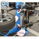 Wessels + Müller Werkstattmesse 2014 FMO 100% synchron - der obere und untere Abdrücker der HOFMANN Reifenmontiermaschine monty 8600 können gegen Aufpreis synchron verfahren.  